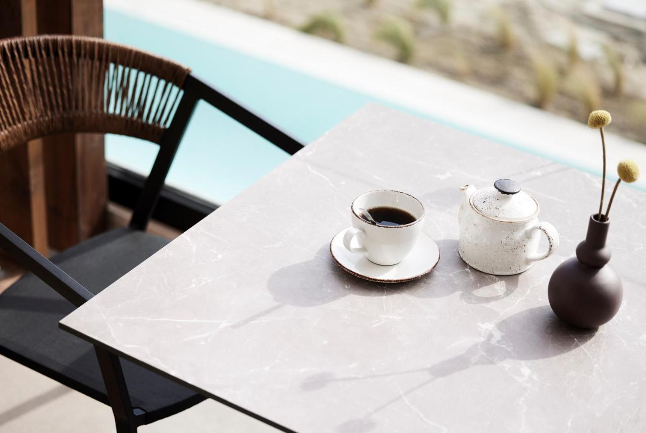 Helea Lifestyle Beach Resort Kallithéa エクステリア 写真 A table with a porcelain tabletop